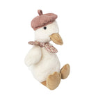 Stuffed duck toy wearing a pink corduroy beret and floral neckerchief.
