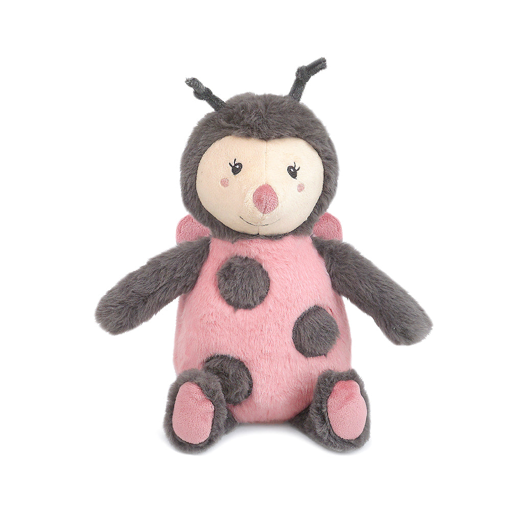 Ladybug plush toy with pink body, gray spots and limbs, and a light pink face.
