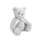 Gray teddy bear with a white ribbon on a white background