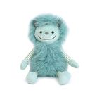 Blue furry monster plush toy with striped arms and legs.
