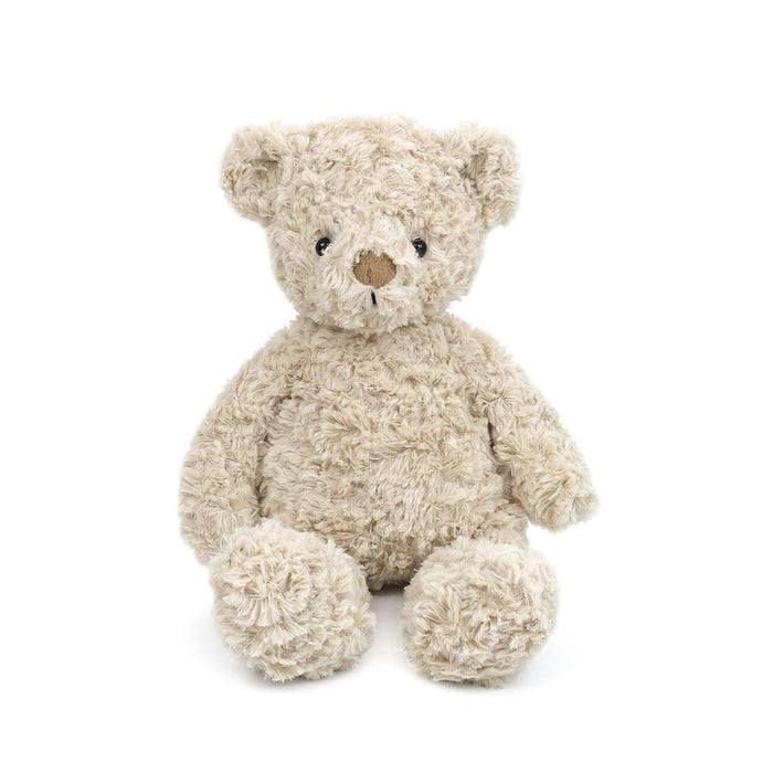 Stuffed teddy bear with a soft texture on a white background