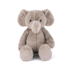 Stuffed, gray elephant sitting upright. 

