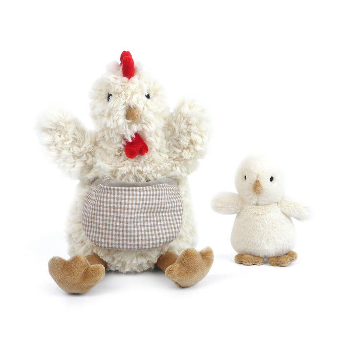 Stuffed chicken and duck toy on a white background