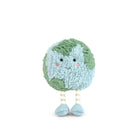 Plush toy resembling a leaf with a face on a white background