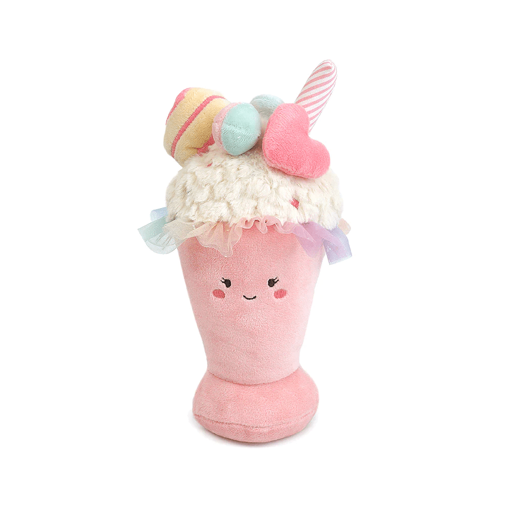Plush toy resembling a pink ice cream cone with a smiling face on a white background