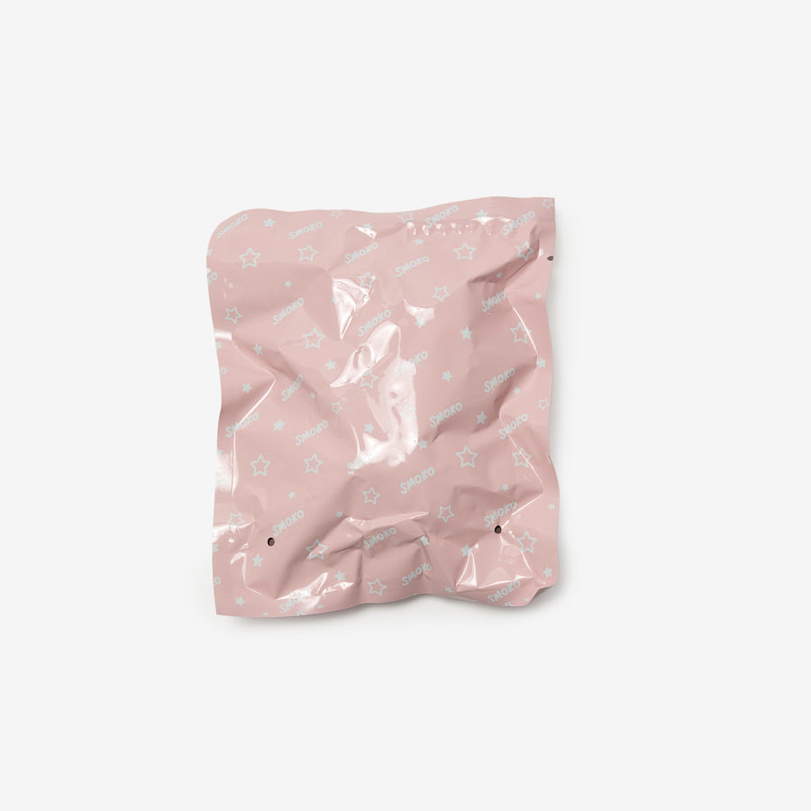 Pink crumpled paper bag on a white background