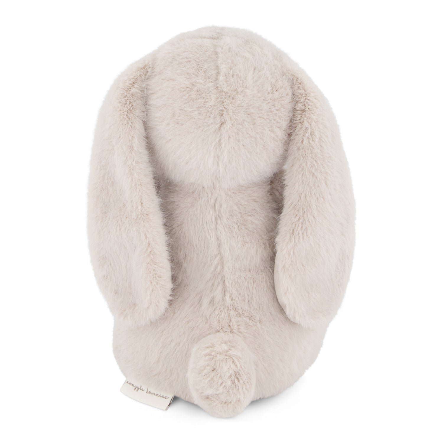 Beige plush bunny toy on a white background
