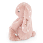 Soft pink plush bunny with white polka dots, embroidered name "Kanya" on ear, side view, 12-inch stuffed toy