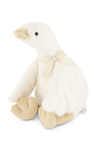White plush duck toy with a bow on a white background