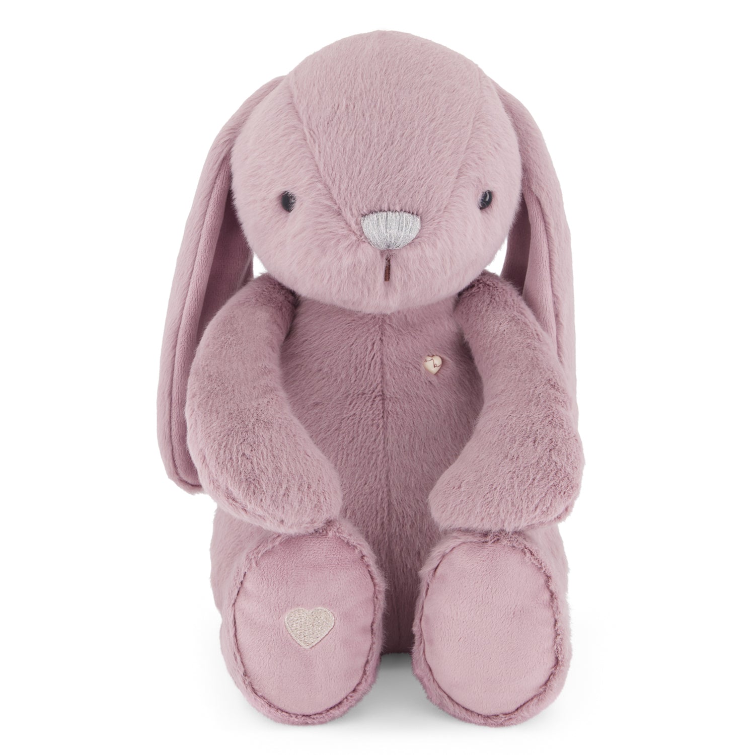 Pink plush bunny toy with heart details on a white background