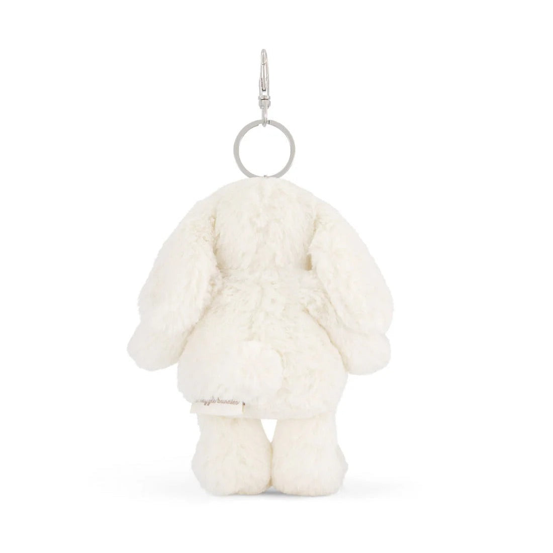 A back view of a cream-colored, plush bunny keychain with a silver ring and clip.