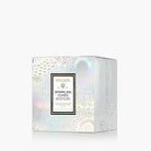 Voluspa Sparkling Cuveée candle packaging on a white background