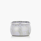 White ceramic jar with decorative patterns on a white background