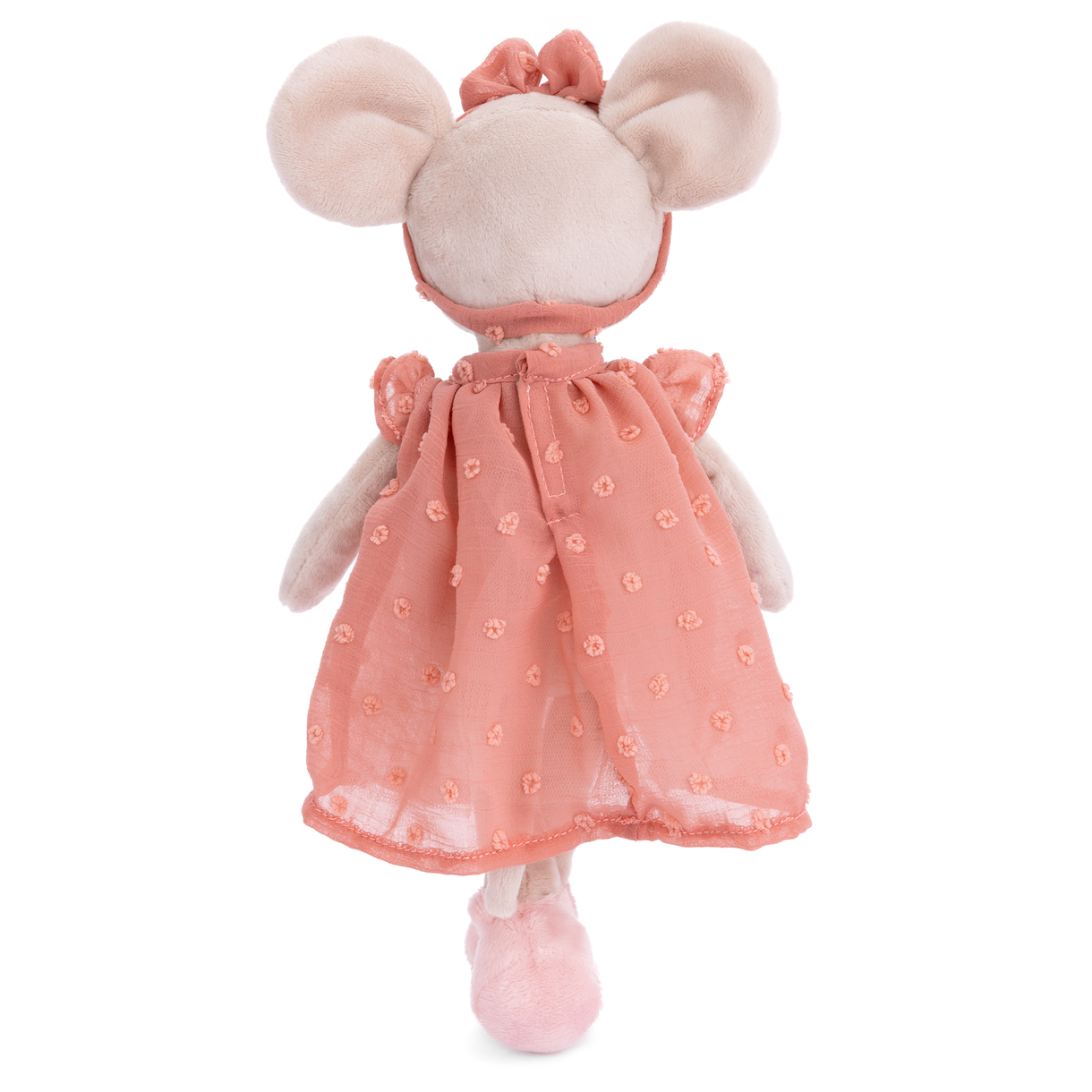 Plush toy with pink dress and ears on a white background