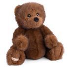 Brown teddy bear with a visible brand label on a white background