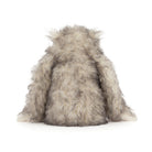 Fluffy gray toy on a white background