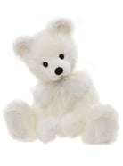 White teddy bear with a bow tie on a white background