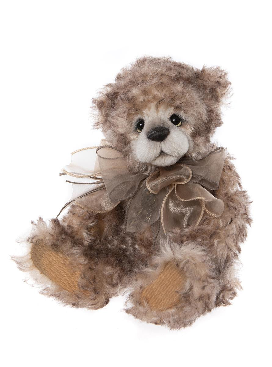Teddy bear with a bow on a white background