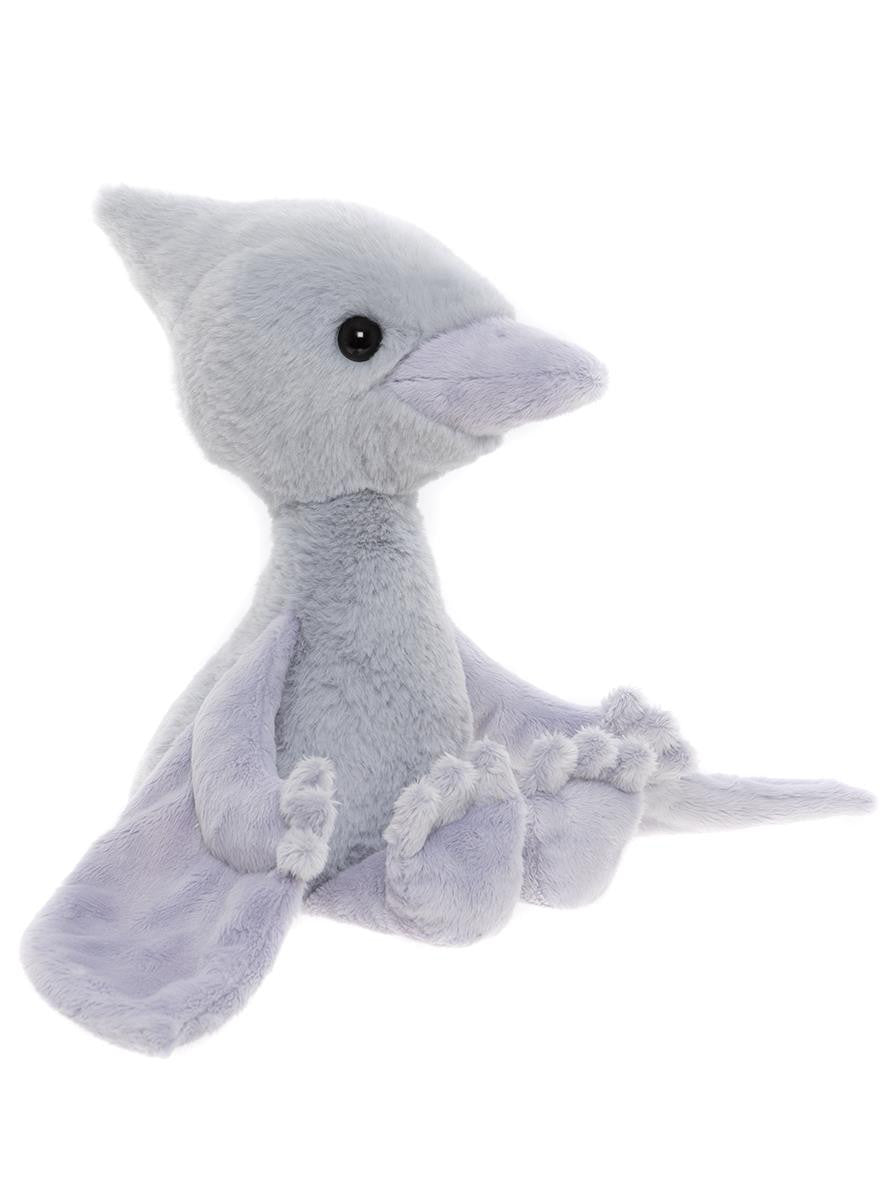Plush toy dolphin on a white background