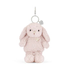A fuzzy, light pink bunny plush toy attached to a metal keychain.