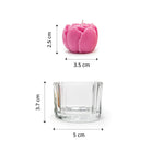 Pink candle in a clear glass holder with dimensions indicated on a white background