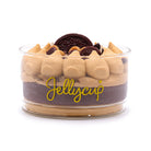 Jelly cup with layered dessert and Oreo cookie on a white background, featuring the Jelly Cup brand.