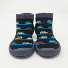 A pair of black socks with colorful car patterns and gray soles.