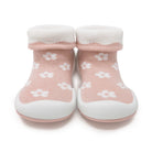 Pair of pink and white baby sock shoes.
