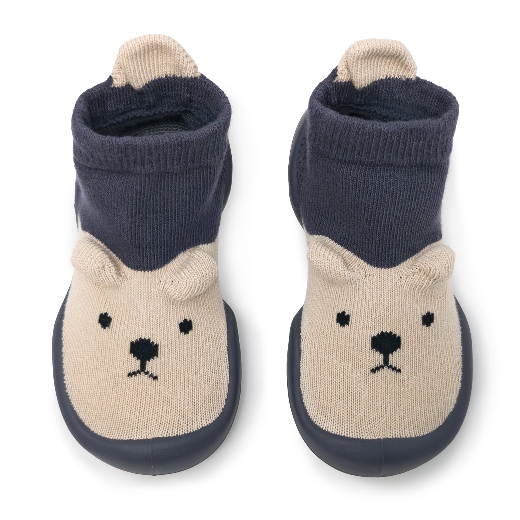 Pair of baby booties with bear face design on a white background