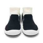 Pair of socks with white tops and black soles on a white background