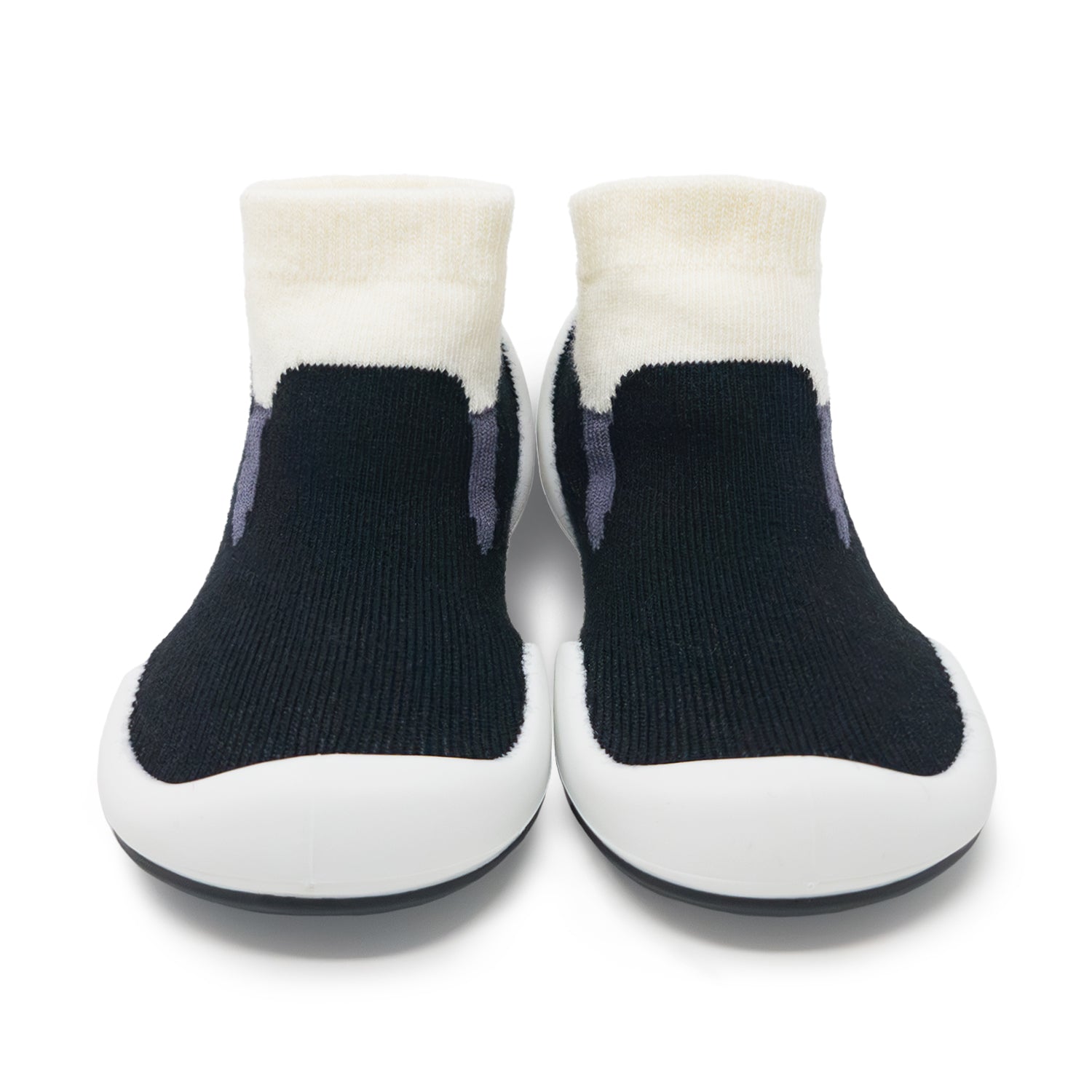 Pair of socks with white tops and black soles on a white background