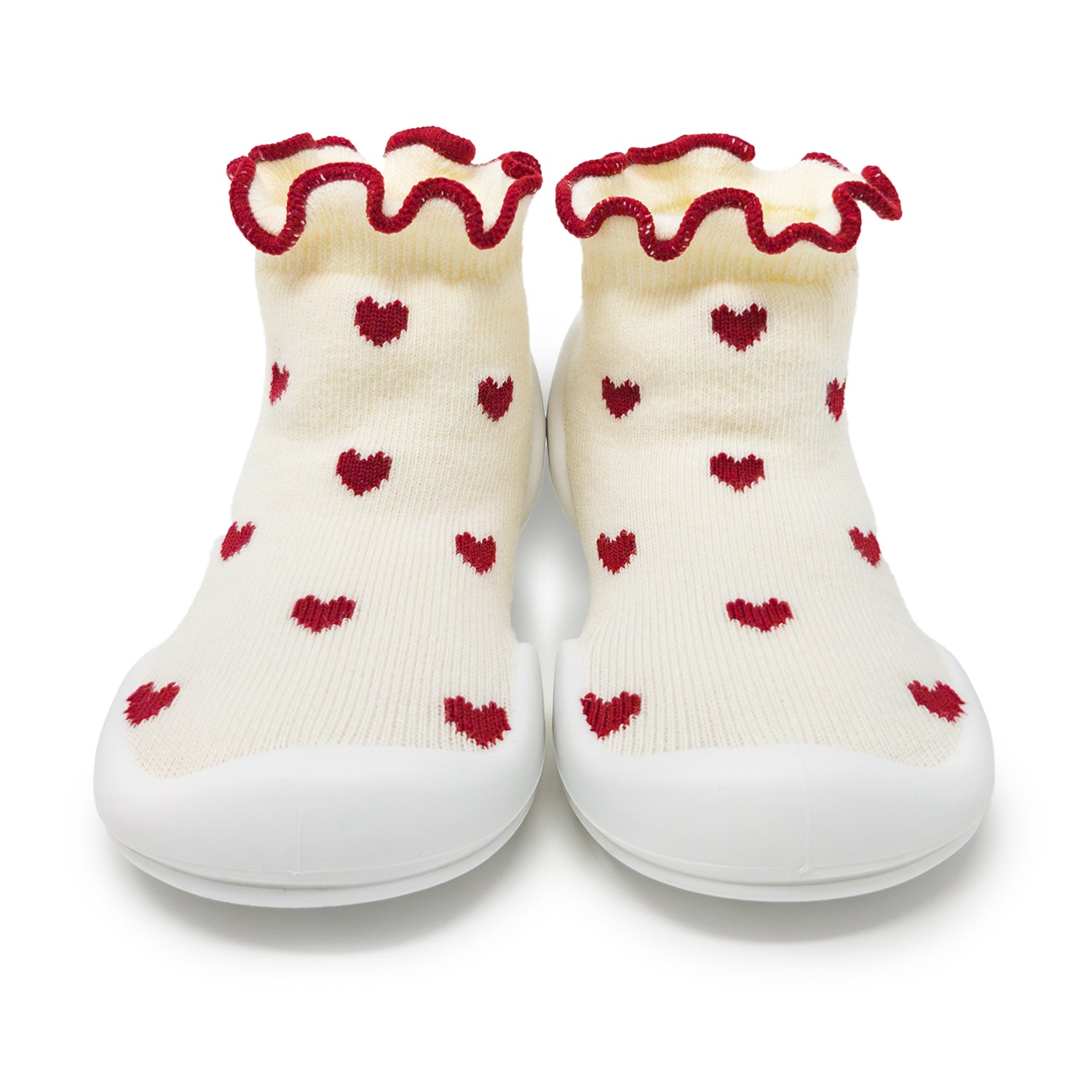 White socks with red hearts and ruffled edges on a white background