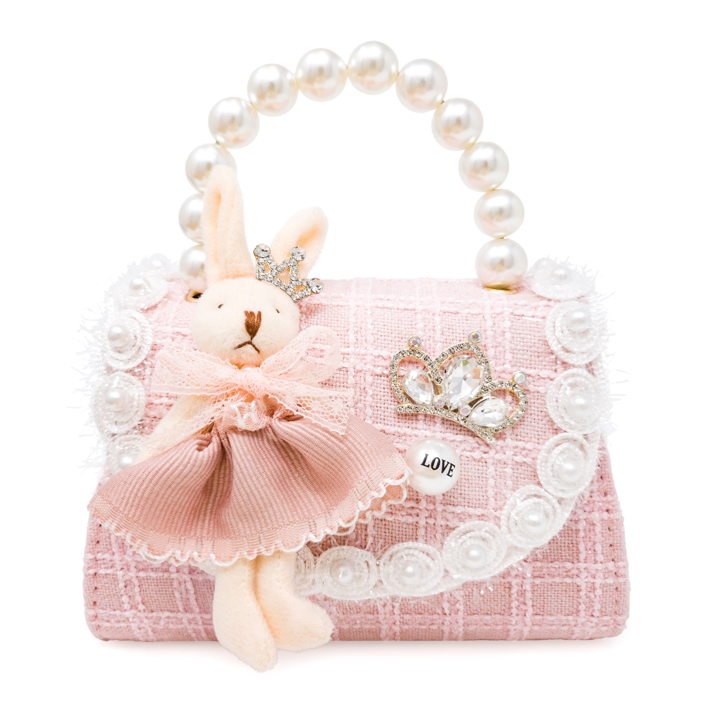 Pink handbag with a rabbit plush toy and pearl handle on a white background