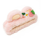 Pink furry headband with bunny ears, strawberry, and flower.