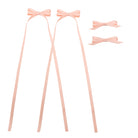 Light pink 4-piece ribbon bow clip set featuring two long trailing bows and two smaller bows.