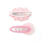 Two pink hair clips with silver metal clips.