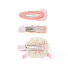Three hair clips.