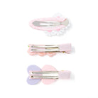Three pink and purple hair clips.