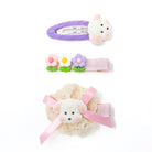 Three decorative hair clips.
