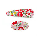 Two flower-print hair clips.