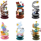 Set of Snoopy-themed figurines on a white background