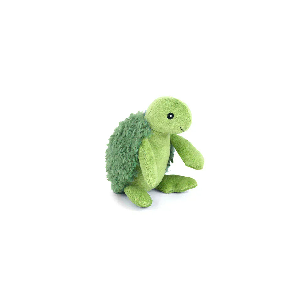 Green plush turtle toy on a white background